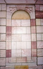 Colorful Sandstone Wall with an Arched Frame