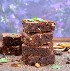 stack of baked square pieces of brownie pie