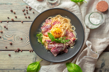 Pasta Carbonara. Spaghetti with bacon, parsel and parmesan cheese