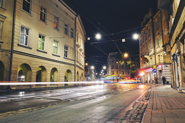 Fototapeta na wymiar Old buildings in the historic district of Krakow at night