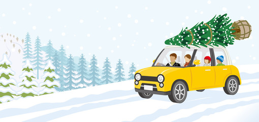 Young family riding the car which loaded the Christmas tree - Winter nature background