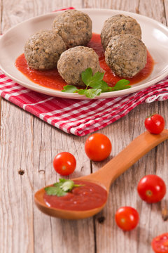 Meatballs with tomato sauce.
