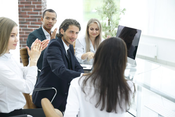 Fototapeta premium business team applauding the speaker at the workshop