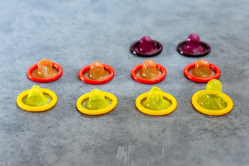 Concept for healthcare - Close up shot of various Colorful condoms