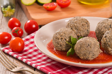 Meatballs with tomato sauce.