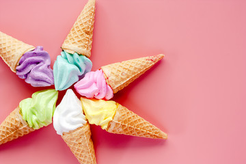 Various of ice cream cone on pink background for sweet and refreshing dessert concept