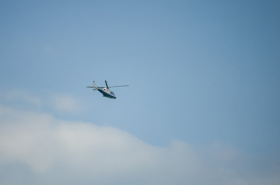 helicopter on a background of clouds