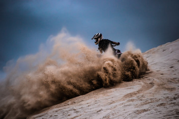 Running with the quad in the sand