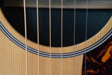 Obraz premium Strings and Sound Hole Of Acoustic Guitar