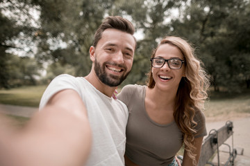 Fototapeta premium portrait of a happy couple on a Park background