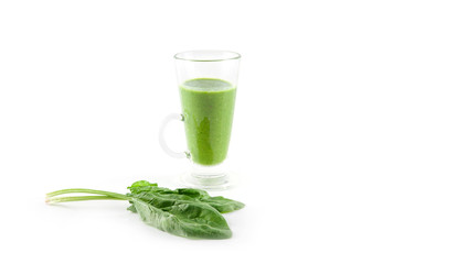 Glass of spinach juice isolated on white