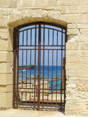 Fototapeta na wymiar Favignana, Trapani, Italy - view from the gate of the Former tuna fish factory (La Tonnara in Italian) in the Aegadian islands