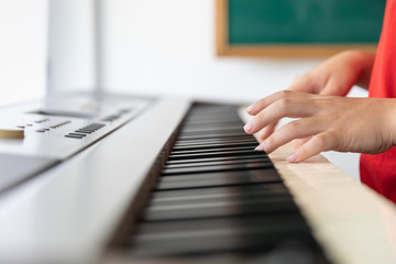 asia students in the music school