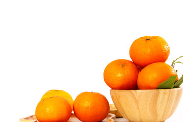 orange golder in a woooder container on table