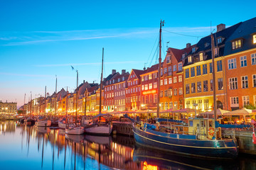 Copenhagen, Denmark on the Nyhavn Canal at night.