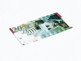 New type of banknote worth 20 Israeli shekels isolated on a white background