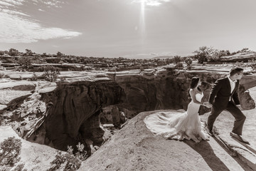 Asian/Vietnamese Bride with her Caucasian Groom.  Utah Desert, near Moab. 