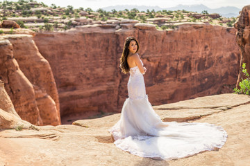 Asian/Vietnamese Bride in her Wedding Dress.  Taken in the Utah desert, near Moab.  