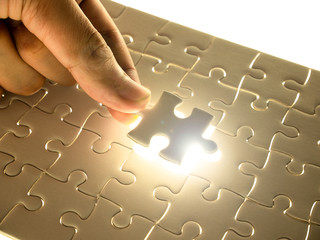 Missing Jigsaw puzzle piece with lighting, business concept for completing the finishing puzzle...