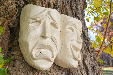 Theatre happy and sad wooden masks