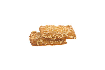 Cookies with sesame seeds isolated on a white background. Sweet cookies. Homemade dough.