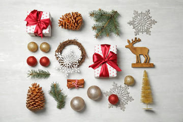 Flat lay composition with Christmas decor on light background. Festive winter design