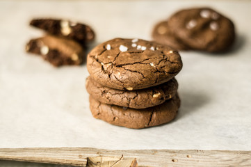 dark chocolate homemade cookies tower with pinch of salt