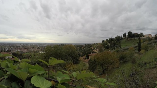 view from Bergamo hills to Po Valley in a cloudy day - italian travel destinations - time lapse