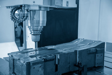 The CNC milling machine cutting the injection mold part by solid ball end mill tool.Mold...