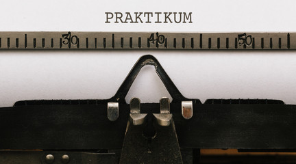 Praktikum written on vintage type writer from 1920s