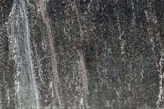 Black marble slab as an abstract background © schankz