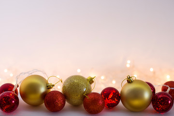 Christmas background with gold and red balls