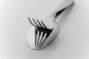 cutlery fork and spoon over white background