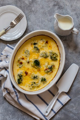 gratin with broccoli in white oval shape with béchamel sauce