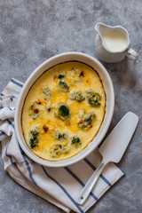 gratin with broccoli in white oval shape with béchamel sauce