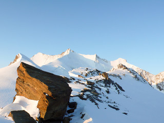 Mischabel mountain range in the Swiss Alps above Saas Fee on a beautiful late fall evening