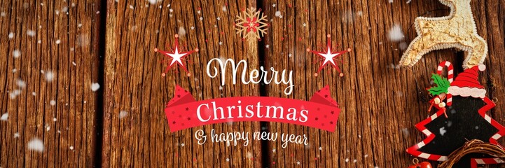 Merry Christmas message on wood background