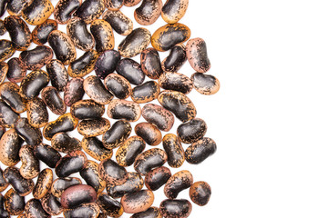 Lot of whole speckled colored butter beans painted lady scarlet runner variety flatlay isolated on white background