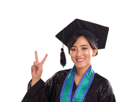 Victory pose of graduating female student, isolated portrait on white background