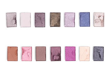 flat lay with arranged bright eyeshadows isolated on white