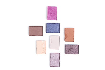 flat lay with arranged bright eyeshadows isolated on white