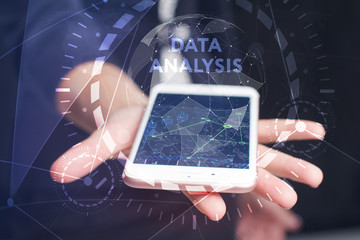The concept of business, technology, the Internet and the network. A young entrepreneur working on a virtual screen of the future and sees the inscription: Data analysis