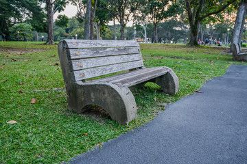 Old style stone park benches in a beach in Pasir Ris Singapore