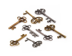 A set of gold and silver keys isolated on white background	