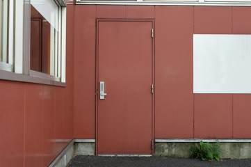 Fototapeta premium sidewalk by street wall & door