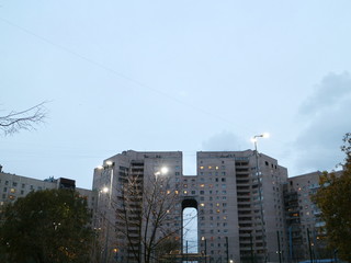 the walls of a tall building at an acute angle