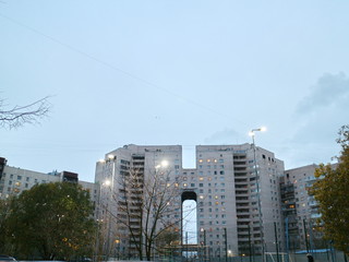 the walls of a tall building at an acute angle