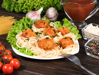 Spaghetti bolognese pasta with tomato sauce, vegetables and minced meat - homemade healthy Italian pasta on a rustic wooden background.