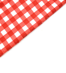 red folded tablecloth over bleached table