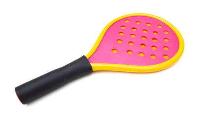toy plastic tennis racket on white